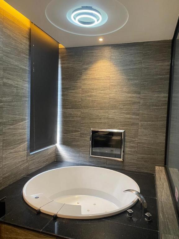 M Hotel Каотун Стая снимка