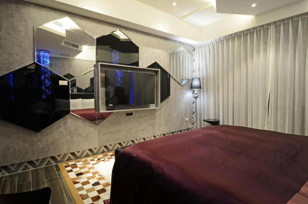 M Hotel Каотун Стая снимка
